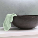 bathroom green washcloth